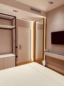 Postel nebo postele na pokoji v ubytování Azul Rooms Tirana