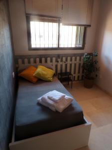 Postel nebo postele na pokoji v ubytování Casa MUNDOVALENCIA