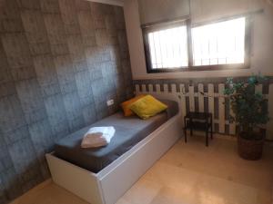 Postel nebo postele na pokoji v ubytování Casa MUNDOVALENCIA