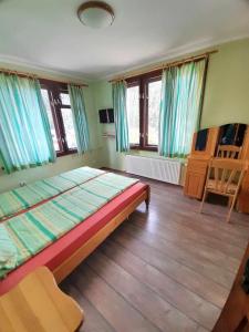 Postel nebo postele na pokoji v ubytování Guest House Lorian
