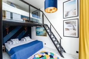Ένα ή περισσότερα κρεβάτια σε δωμάτιο στο Apartament Bliżej Słońca