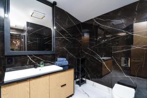 Ένα μπάνιο στο Apartament Bliżej Słońca +9 φωτογραφίες