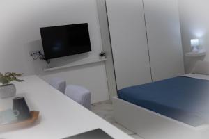 TV a/nebo společenská místnost v ubytování La casa di mest Pepp