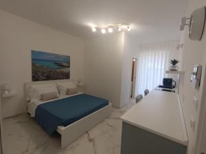 Postel nebo postele na pokoji v ubytování La casa di mest Pepp
