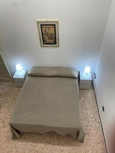 Letto o letti in una camera di GARIBALDI HOUSE