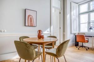 Posezení v ubytování Private bedrooms in the Heart of Lisbon + 2 fotografie