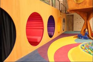 a room with a colorful floor with three windows at Hotel Nacional in Rio de Janeiro +5 photos
