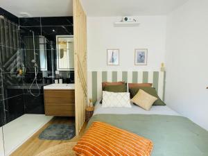 Katil atau katil-katil dalam bilik di Le Repos du Pilat proche à 10 min Saint Etienne