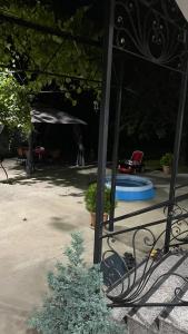 a park with a frisbee in a yard at Dream House in Batumi