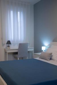 Postel nebo postele na pokoji v ubytování La casa di mest Pepp