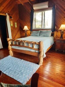 Posteľ alebo postele v izbe v ubytovaní Guava Grove Resort & Villas