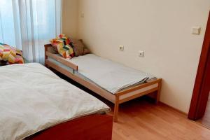 a small bedroom with two beds in a room at Nessebar Fort Club apartment 363 in Sunny Beach +28 photos