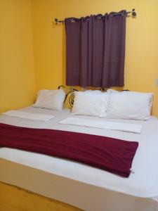 Postel nebo postele na pokoji v ubytování Cabañas Martina Surf Playa Guanico