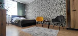 Posteľ alebo postele v izbe v ubytovaní Apartament przy Parku