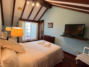 TV a/nebo společenská místnost v ubytování Preciosa casa en playa América