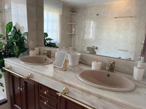 Koupelna v ubytování Preciosa casa en playa América + 33 fotografií