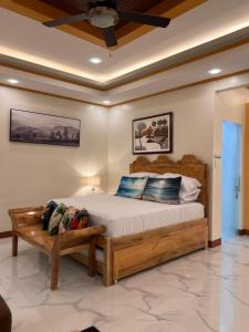 Postel nebo postele na pokoji v ubytování 3BR Oceanfront Vacation House in Lila, Bohol