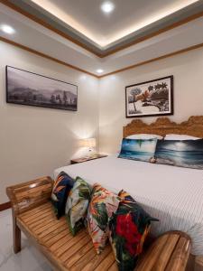 Postel nebo postele na pokoji v ubytování 3BR Oceanfront Vacation House in Lila, Bohol