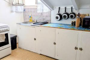 Køkken eller tekøkken på Appartement Malendure Bay