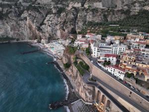 an aerial view of positano on the amalfi coast at Seaside JEM in Meta +18 photos