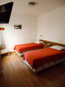 Postel nebo postele na pokoji v ubytování Residencial Ski + 24 fotografií