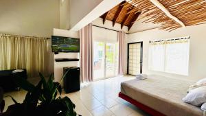 Voodi või voodid majutusasutuse Coco House by Be Happy toas