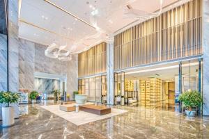 Vstupní hala nebo recepce v ubytování Eastern Casa Hotel Yiwu