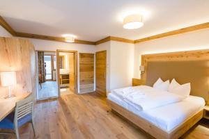 Posteľ alebo postele v izbe v ubytovaní Hotel Giessenbach