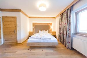 Posteľ alebo postele v izbe v ubytovaní Hotel Giessenbach