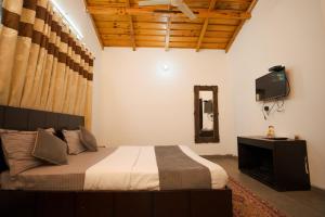 Televisyen dan/atau pusat hiburan di Cottages @ Village