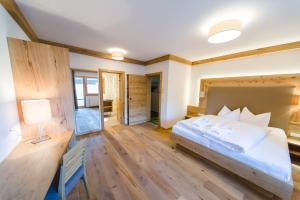 Posteľ alebo postele v izbe v ubytovaní Hotel Giessenbach