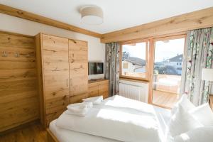 Posteľ alebo postele v izbe v ubytovaní Hotel Giessenbach