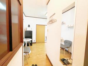 Una televisión o centro de entretenimiento en 西武新宿線 駅近最大4人d2