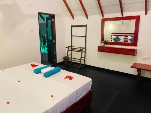 Letto o letti in una camera di Sigiri Enaya Cottage