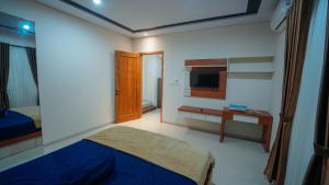 Postel nebo postele na pokoji v ubytování Guest House Sambilegi + 3 fotografie