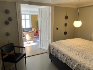 Postel nebo postele na pokoji v ubytování 1. etg i Dampskipsbrygga, Lødingen havn