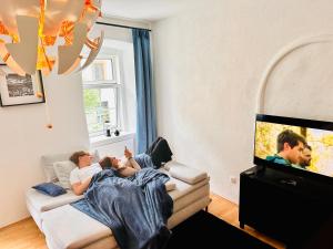 TV a/nebo společenská místnost v ubytování Schöne Ferienwohnung