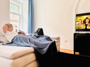 TV a/nebo společenská místnost v ubytování Schöne Ferienwohnung
