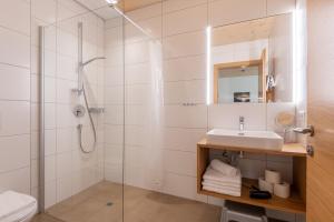 Kúpeľňa v ubytovaní Rössle Appartements + 37 fotografií