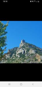 Nespecifikovaný výhled na hory nebo výhled na hory při pohledu z prázdninového domu + 2 fotografie