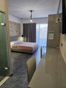 Posteľ alebo postele v izbe v ubytovaní The Santo George Beach Resort