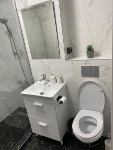 Et badeværelse på Apartament Mamaia Nord