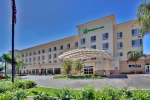 a rendering of a hotel with a building at Holiday Inn & Suites Bakersfield by IHG in Bakersfield