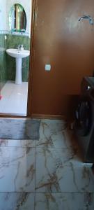 a bathroom with a sink and a toilet at Дом для отдыха близко Батуми in Batumi +19 photos