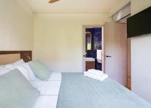 En eller flere senge i et værelse på Sopelana Beach Aparment! + 12 billeder