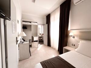 Postel nebo postele na pokoji v ubytování Park Hotel Giusy