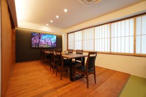 TV o dispositivi per l'intrattenimento presso Bird Hostel Palace Side Suite