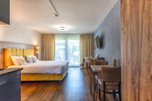 Posteľ alebo postele v izbe v ubytovaní Hotel Residence Loren - contact & contactless check-in