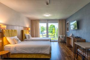 Posteľ alebo postele v izbe v ubytovaní Hotel Residence Loren - contact & contactless check-in
