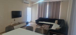 TV a/nebo společenská místnost v ubytování Apartament Jony